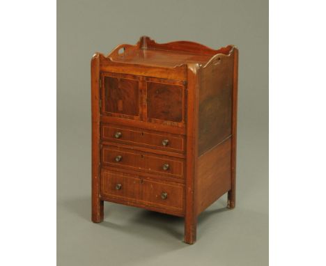 A Georgian mahogany commode, converted to a cupboard and chest.  Height 75 cm, width 50 cm.