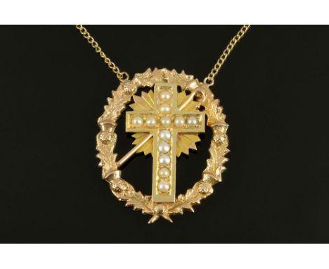 A 9 ct gold chain with 9 ct gold seed pearl set cross pendant, 9.9 grams.