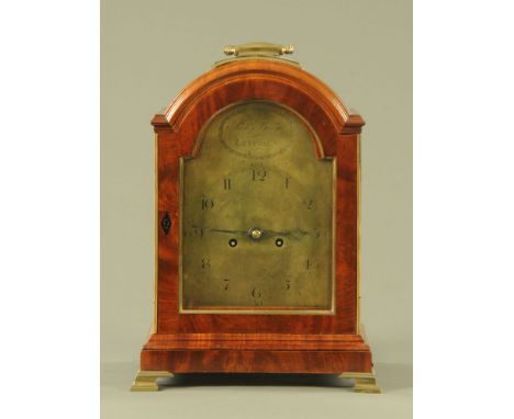 A Regency well figured mahogany and brass mounted bracket clock by Robert Bunyan Lincoln, with twin fusee movement striking o