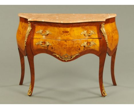 A Louis XV style walnut veneered commode, two drawers and with variegated marble top metal handles and mounts and raised on c