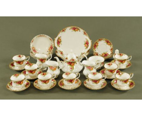 A Royal Albert Old Country Roses tea service, comprising teapot, 9 cups, 12 saucers, large plate, bowl, 2 milk jugs, 5 bowls,