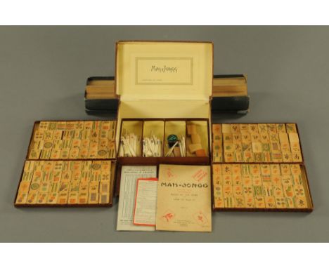 A Hamley Brothers Ltd London mahjong set, in leatherette case and complete with stands.