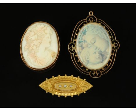 Three 9 ct gold mounted brooches, one cameo, one with print the other with seed pearls and clear stone.