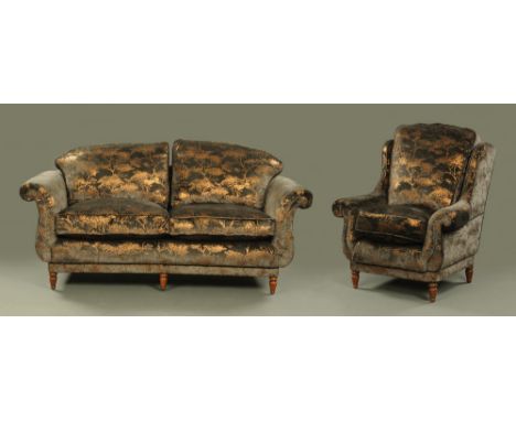 A gold and black upholstered two piece suite, by Stephen Ball Handmade Sofas, with chair and two seater settee, both with scr