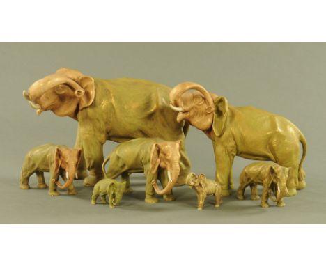 A group of five Royal Dux graduated elephants, each in standing pose with raised trunk.  Tallest 36 cm, smallest 12 cm. toget