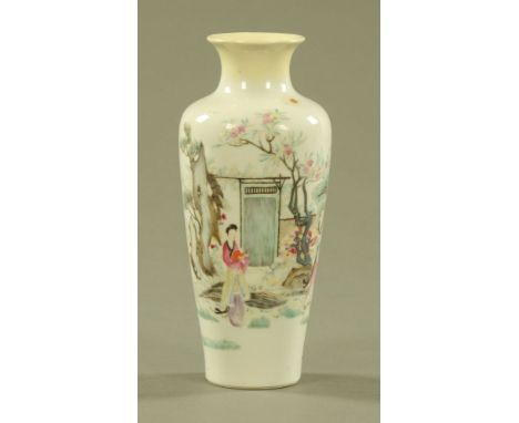 A Chinese vase, decorated with figures in a garden and with seal mark to base, lip restored.  Height 22.5 cm. CONDITION REPOR