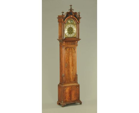 A George III mahogany longcase clock by Thomas Dodd Chester, with verre eglomise between the swans neck pediment and with gla