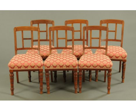 A set of six James Shoolbred &amp; Co walnut dining chairs, circa 1900, bearing plaque Tottenham House London (see illustrati