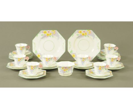 A Melba bone china "Lilac Time" tea set, 8 cups, 12 plates, 2 sandwich plates and sugar basin. CONDITION REPORT: Two of the c