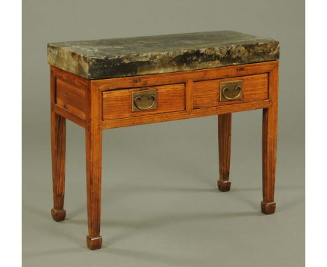 A Chinese side table, with ceramic top stamped to one end, the base fitted with two drawers and all raised on tapered legs of