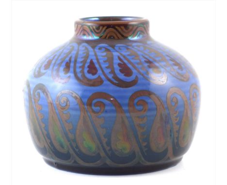 Royal Lancastrian vase by William S Mycock dated 1927 painted with scrolling leaves on a blue ribbed ground, painted and impr