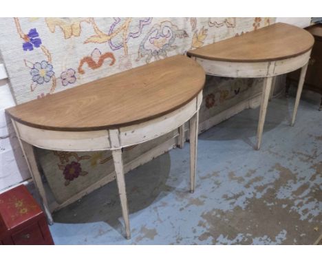 CONSOLE TABLES, a pair, late 18th century George III mahogany demi lune with distressed white painted tapered supports, 116cm