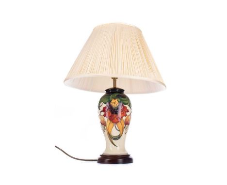 MOORCROFT TABLE LAMP,of inverted baluster form, with floral tube lined decoration on navy and cream grounds, on wired base, 3
