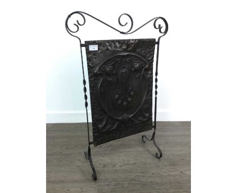 ART NOUVEAU COPPER FIRESCREEN,with relief foliate detail on scrolled wrought iron frame, 74cm high