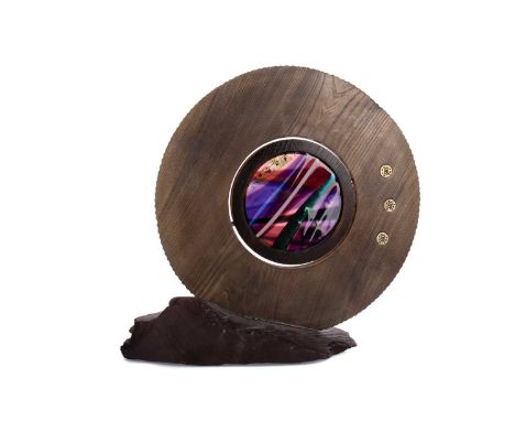 * SCOTT IRVINE (SCOTTISH b 1970), DISCUSwooden sculpture with rotating fused glass panel on slate plinth49cm high approxCondi