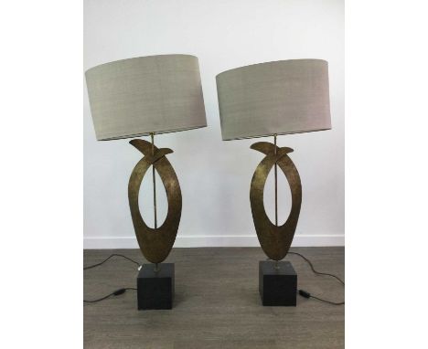 PAIR OF TABLE LAMPS BY PORTA ROMANA,textured gilt metal raised on black slate bases, 96cm high to sconce, with shadesConditio