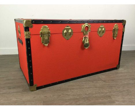 BRASS BOUND CABIN TRUNK,with black lacquered edging over red panels, 93cm wide