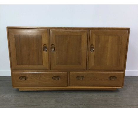 ERCOL SIDEBOARD,in elm, three cupboard doors above twin drawers, 130cm wideCondition report: Condition generally good. Some a