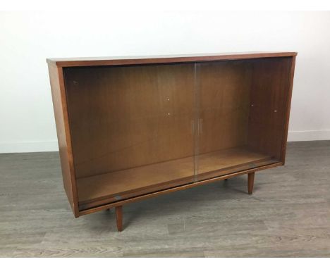 MID-20TH CENTURY TEAK DISPLAY CABINET,the twin glazed doors enclosing single shelf, on tapered supports, 76cm high, 113.5cm w