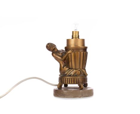 ART DECO BRONZED SPELTER FIGURAL TABLE LAMP,modelled in the form of a crouching female nude, 20cm high to fitting, lacking sh