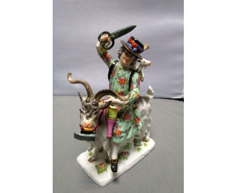 A Meissen model of Count Bruhl's tailor holding his scissors aloft as he rides a goat with a clothes iron in its mouth, two k