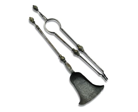 A 'Surrey' enamelled brass knopped steel fire shovel and tongs, second half of the 17th century, the ball knops cast in brass