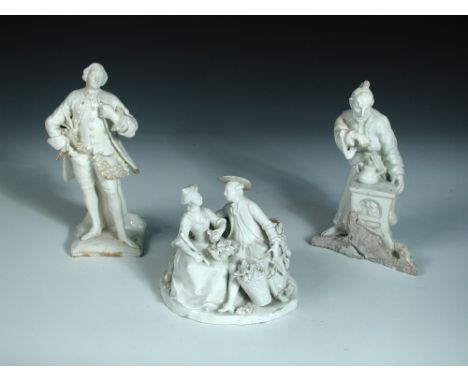 An 18th century Vienna 'Vendange' group, of a man with a pannier of flowers, the woman with a basket of grapes, a child behin