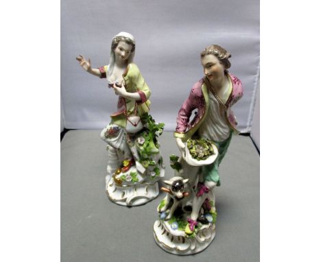 A pair of Meissen figures of a boy and girl, he wearing a puce foliate decorated jacket, green britches, holding his hat full