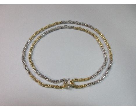 An 18ct bi-colour gold chain by Kutchinsky with separate diamond clasp to enable it to be worn shorter, the chunky fancy anch