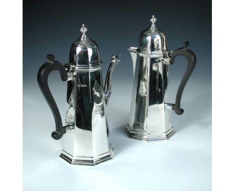 A silver cafe-au-lait set by The Goldsmiths' and Silversmiths' Company Ltd, Sheffield 1919, the coffee pot of tapering octago