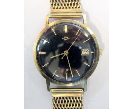 Movado - a gentleman's 9ct gold case automatic wristwatch, the black dial with gold coloured baton numerals, centre sweep sec