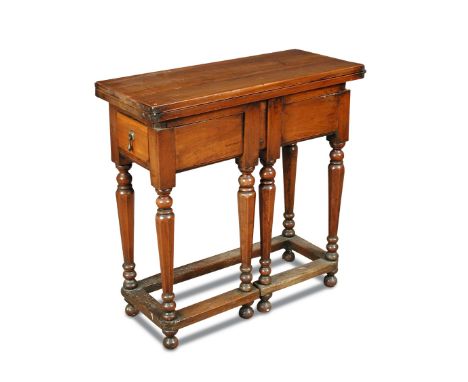 A small William & Mary yew wood side table, with fold over action and on octagonal tapering gateleg supports joined by stretc