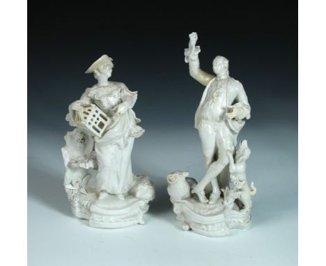 A pair of Bow white glazed figures symbolic of Liberty and Matrimony, the lady by a fountain holding an open bird cage, a lam