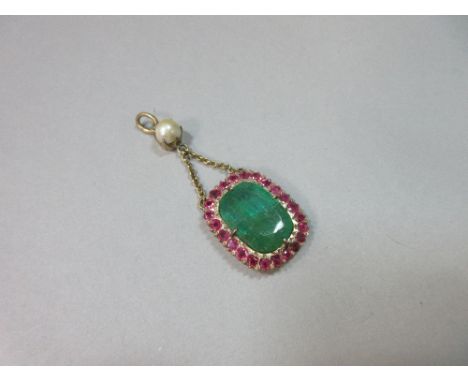 An emerald, pink sapphire and pearl pendant, the cushion cut emerald, measuring 15.4 x 11.3mm, claw set in a border of round 