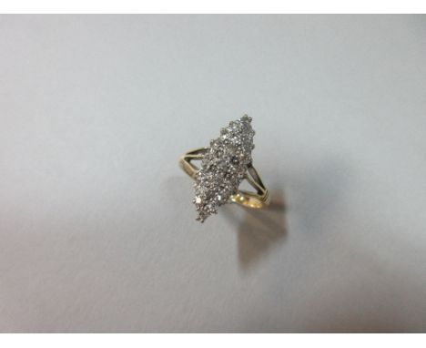 A marquise shaped diamond ring, the old round cut diamonds millegrain pavé set in white precious metal to trident shoulders a