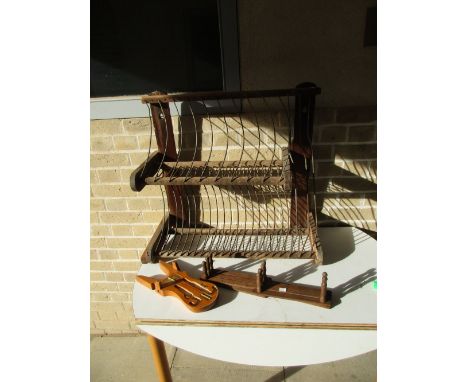 A plate draining rack, a set of ten concertina action coat hooks and a boot jack, the rack of pine and wire work, 67cm (26.5 