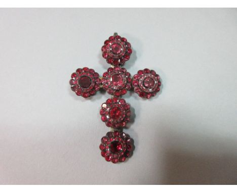 A garnet cross made up of six Georgian buttons, composed entirely of flat-cut almandine garnets in closed-back and foiled set