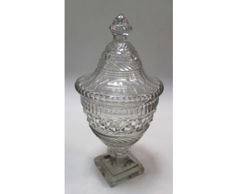 A late 18th/early 19th century Irish sweetmeat jar and cover, the ovoid body cut with central diamond diaper band, a disc kno