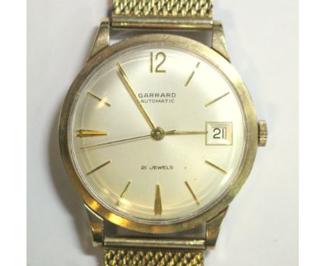 Garrard - a gentleman's 9ct yellow gold cased automatic wristwatch, the silvered dial with gold coloured baton numerals with 