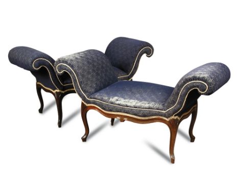 A pair French Hepplewhite mahogany framed window seats, each with out-scrolling arms and serpentine seat fronts, upholstered 