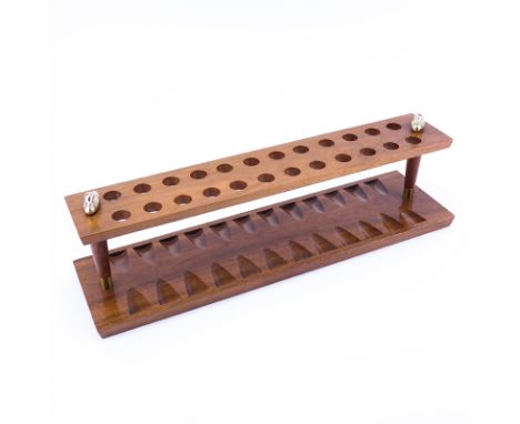 Vintage Duk-It McDonald Walnut 24 Slot Pipe Stand. Original labels on underside. Good condition. Measures 6-3/4" H x 21-1/4" 
