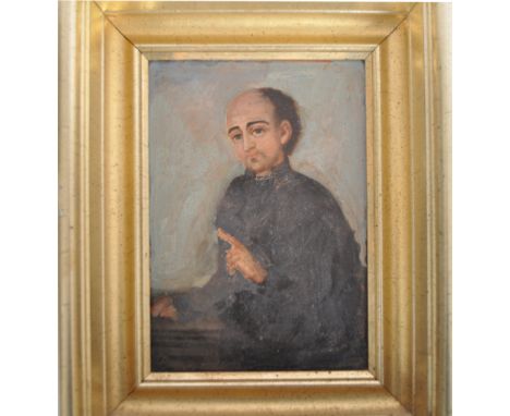 A 19th century Spanish school, oil on board, portrait painting depicting seated monk in robes with finger pointing to the hea