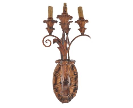 A large 19th Century Victorian giltwood wall light sconce having a four branch arm on scrolled supports. Carved and gilt wall