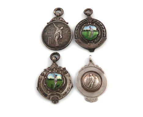 A collection of four silver cricket fobs, various dates and makers, comprising two with enamel cricketers, with ring attachme
