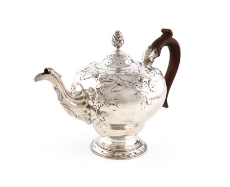 A George III silver tea pot, maker's mark partially worn, W.P over R.P, possibly for W and R Peaston, London 1761, inverted p