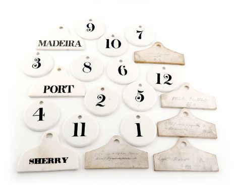 A collection of 19th century ceramic bin labels, comprising: three of hanger form, titled 'PORT', 'SHERRY' and 'MADEIRA', plu