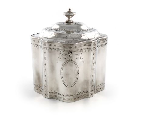 A George III silver tea caddy, possibly by Samuel Wood, London 1786, shaped oval form, bright-cut foliate decoration, the hin