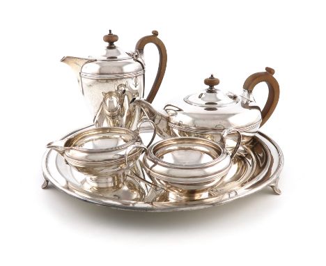 A four-piece silver tea set and matching salver, Thomas Ducrow &amp; Sons, the salver by H.S.E, Birmingham 1946, circular for