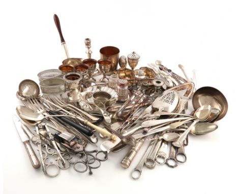 A large collection of old Sheffield and electroplated items and flatware, including a taper stick, a butter shell, a beaker, 