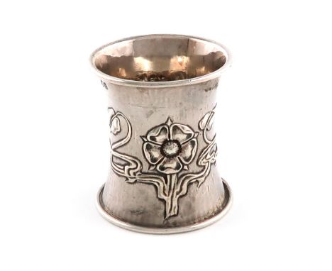 An Edwardian Arts and Crafts silver napkin ring, over-stamped with maker's mark of Omar Ramsden, (probably over the earlier R